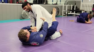 Closed Guard using 2 on 1 Grip: X-Guard to Leg Drag Sweep - Gi
